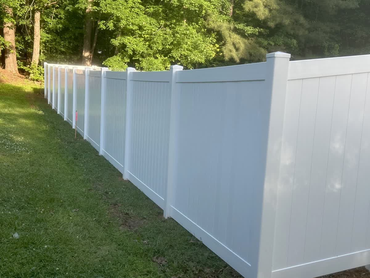 Fence with Residential white vinyl privacy fence in Raleigh-Durham North Carolina