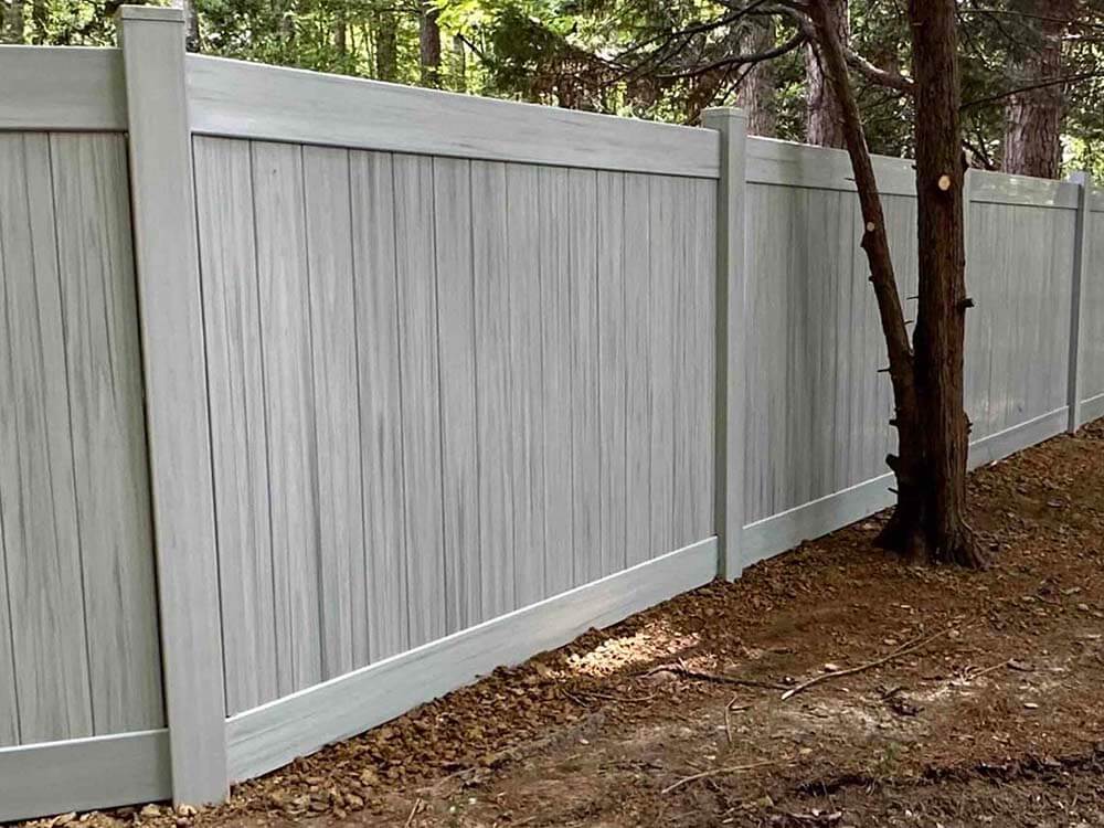 Fence with Wood Grain Privacy Vinyl Fence Installation Company in Raleigh-Durham NC for Residential Homes in Raleigh-Durham North Carolina